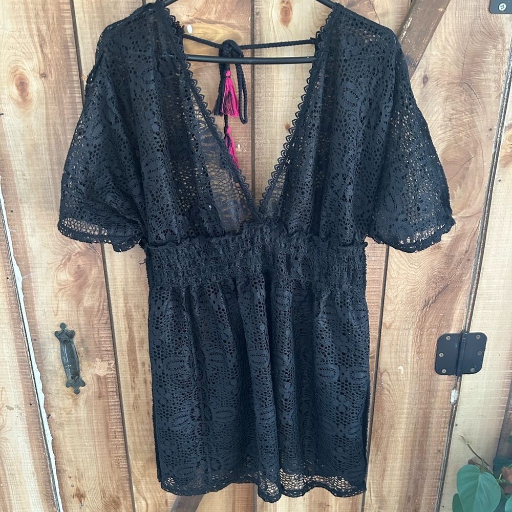 Xhilaration lace beach cover-up featuring a deep V-neck and pink tassel Vacation
